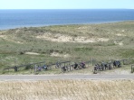 Riding a bike or hiking through the dunes